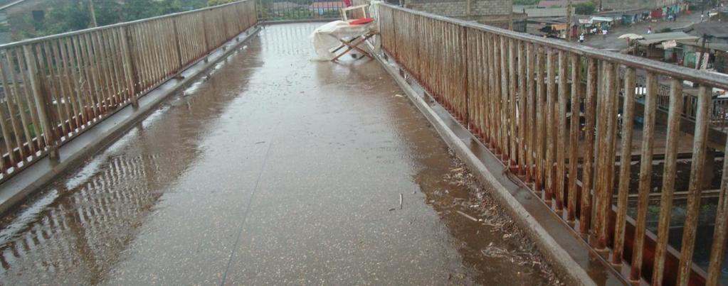 Picture 6: Uthiru pedestrian footbridge with a pool of rainwater Source: Author, 2012 Picture 7: Safe crossing at 87 Estate Trading Centre Source: Author, 2012