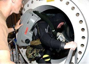 Figure 17. MK 16 diver entering NEDU s Ocean Simulation Facility chambers.