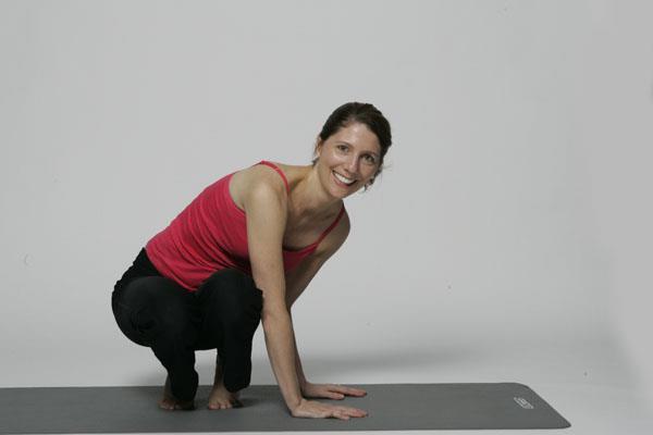 Preparation Posture Side Arm Balance Squat and place your hands on the mat to