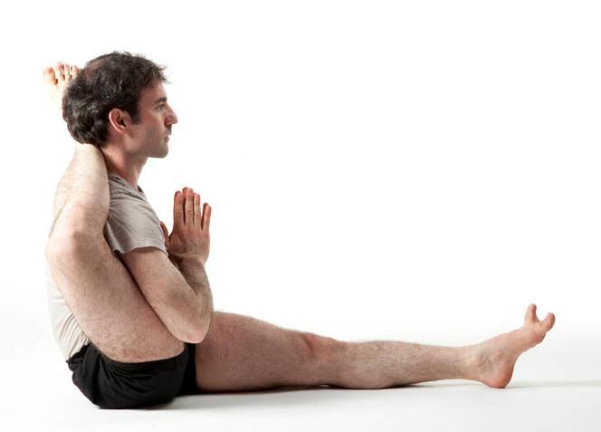 Advanced Seated Postures 24) One Leg Behind Head Posture In forward fold position (Eka Pada Sirsasana (Skandasana) Benefits: Stretches the hips and hamstrings Promotes balance and concentration
