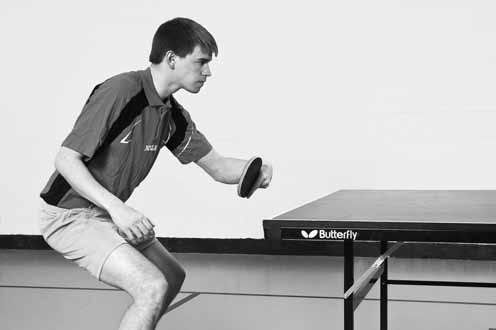 Table Tennis: Steps to Success Figure 9.3 Punch Block With Shake-Hands Grip Beginning Position 1. Move so ball is in center of backhand triangle 2. Bring racket back parallel to end line 3.