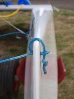 Assure that the knots on both bow braces are the same length.
