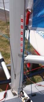 This consists of 2 single tack pulleys that go either side of the main sail and a single pulley