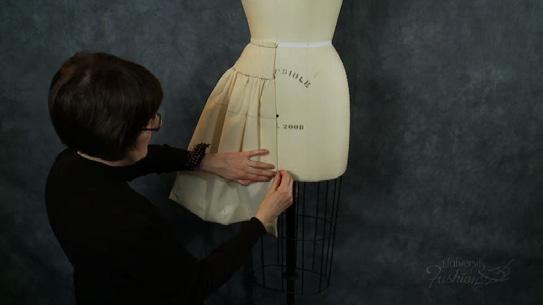 Module 9 Skirt Trueing & Finishing Step 7 Put the skirt drape back on the dress form pinning it to the dress form at