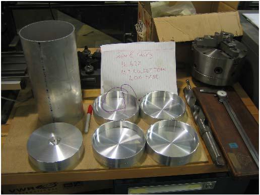testing of the tanks. A precision of 0.001 inch was achieved for the ID of the end-caps in the lathe. For a detailed description of the fabrication process, see Appendix C.