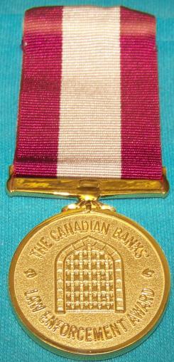CANADIAN BANKS LAW ENFORCEMENT AWARD Unofficial Medal (not in the Canadian Order of precedence) This award is given for outstanding service in combating crime against banks.