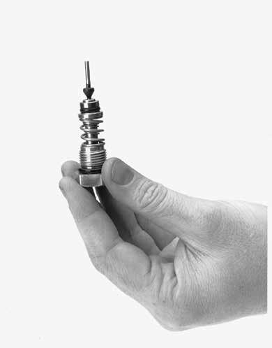 Stack the following parts on the Bottom Cap in the order shown in the drawing: Return Spring, Stem Guide, Orifice Spring, Orifice, Orifice O-Ring, Back-Up Washer, Plug and Stem NOTE: The plug on the