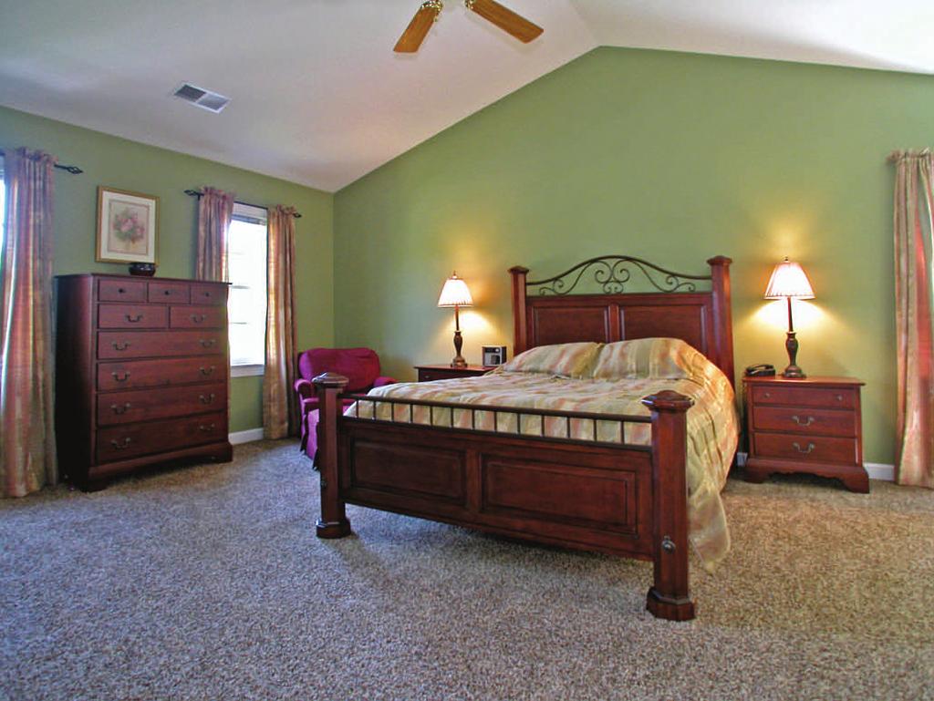 Serene and spacious master suite is situated on the second floor of the home, featuring: Multiple windows