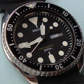 Looking at the last picture of the watch on Brian s wrist, you also get the idea that the bezel is slightly stepped, with the knurled upper ring being a slightly smaller circumference than the lower