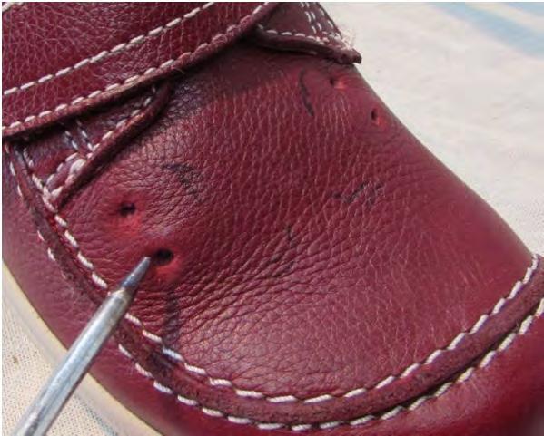 Mark lace clip hole's position on the shoe.