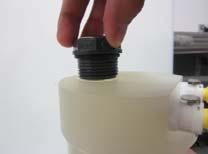Unscrew the stopper from the disinfectant ca