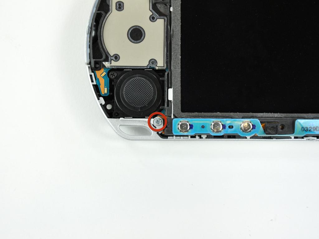 Step 7 LCD Remove a single Phillips screw securing the