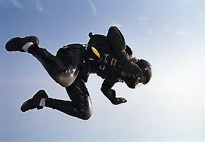 Style jumpers routinely take advantage of the additional maneuverability made possible by flying in the more unstable style tuck. The hands and legs are actually positioned below the torso.