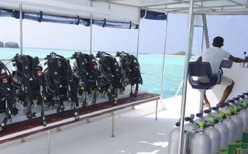 DIVE BOATS & SAFETY Customised fast fiber-glass dive boats with a sun deck for post-dive relaxing and sunning: AQUAHOLICS dive & revive service Toilet and