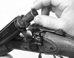 Loading and Unloading Your Shotgun (cont d) TO LOAD: 1. Make sure the ammunition that you are using is the correct size and gauge. The barrels are marked with the gauge and chamber size.