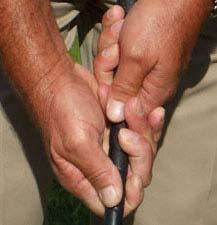 Here is a photo of the grip taken by most amateurs. You see how the right hand is under the club a bit. This is called a strong right hand.