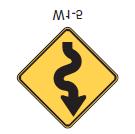 Proper signing can assist motorists through curves without leaving their lane.