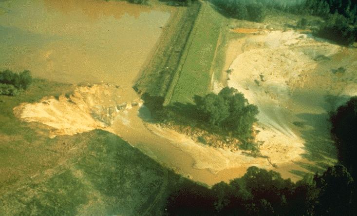 Figure 4. Overview of the failed auxiliary spillway at Black Creek No. 53 Dam (Photo courtesy of Darrell Temple). III.