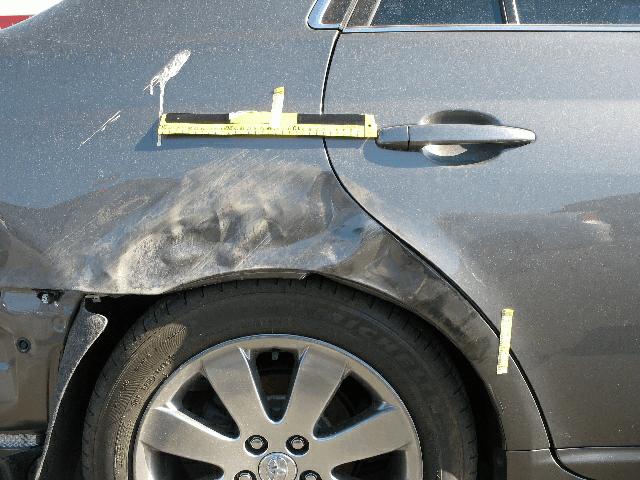 The two impacts between the Toyota Avalon and the fences resulted in minor front and right side vehicle damage. The front of the case vehicle sustained 9.0 cm (3.