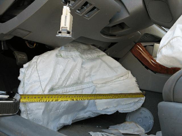 As a result of the longitudinal deceleration of the Avalon during the impact with the utility pole, the driver s front and knee air bags deployed and the driver s seat belt retractor pretensioner