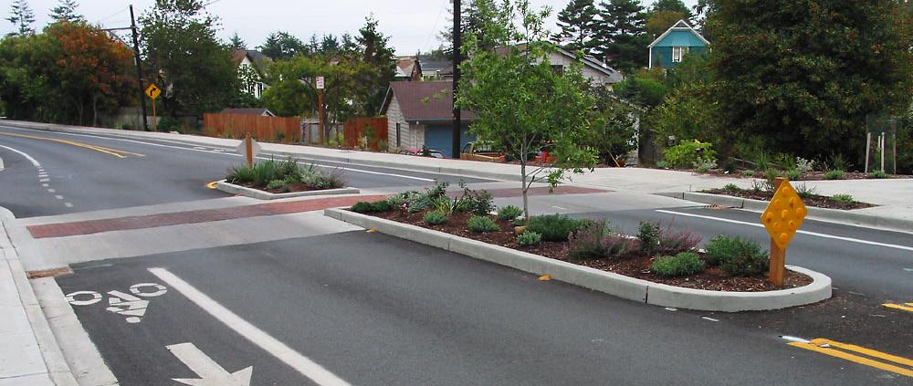Accessibility: All corner features, such as curb ramps, landings, call buttons, signs, symbols, markings, and textures, should meet accessibility standards and follow universal design principles.