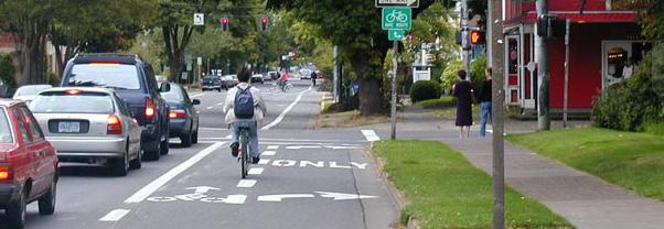 Intersection treatments can improve both queuing and merging maneuvers for bicyclists, and are often coordinated with timed or specialized signals.