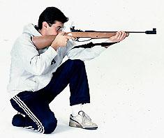 The second photo below, shows a school-age shooter with a sporter air rifle.