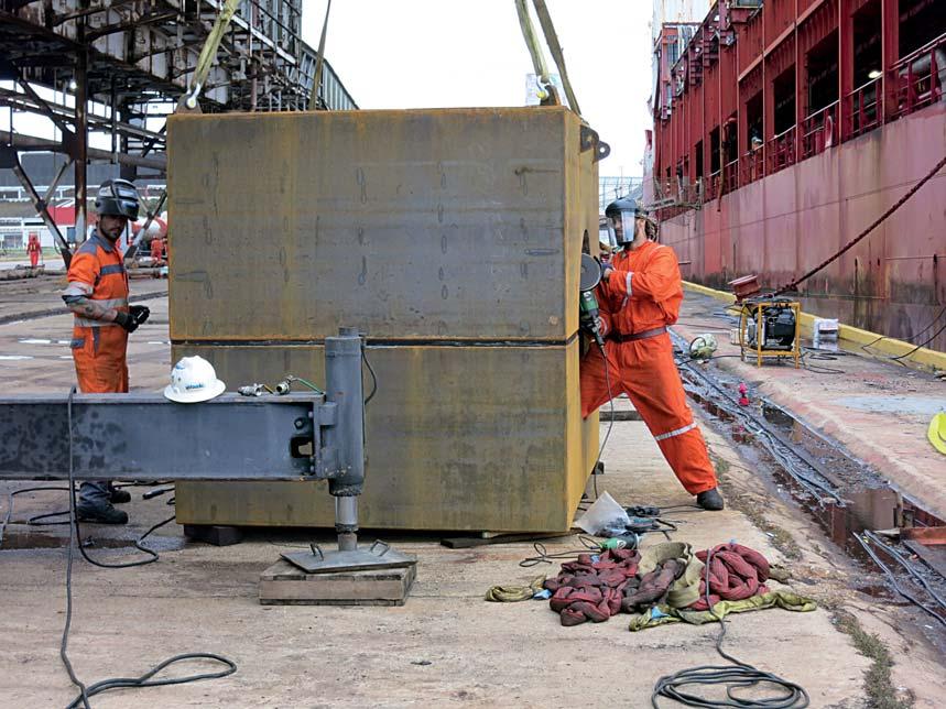 Hydrex technicians working on the cofferdam. Dry area created around gearbox of starboard azimuth thruster. Cofferdam lowered into the water for azimuth thruster operation.