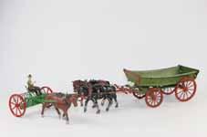 Lot 1453 Britains Farm Plow and Wagon good Condition no box 6 pieces.
