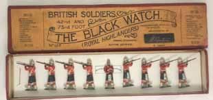 Estimate $2500-3500 Lot 2075 Britains Set #120 The Coldstream Guards Tied in original Fred Whisstock box. Pre War.