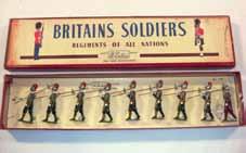 Estimate $100-150 Lot 2126 Britains: Set #1366 French infantry in Action 1933-34 Khaki Dress, steel helmets, 2 standing