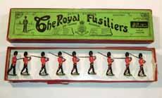 Estimate $200-300 Lot 2162 Britains: Set # 74 Royal Welch Fusiliers, Loose 7 marching at the slope, with officer in