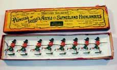 Estimate $160-220 Lot 2181 Britains: Pre-War Set #11 Blackwatch 8 charging fixed rifles in Britain s box #15 Argyle and