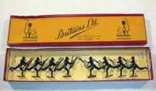 Estimate $100-140 Lot 2387 Britains: Early Set # 120 Coldstream Guards, Loose 9 kneeling firing and 1