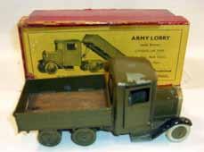 Estimate $100-200 Lot 2467 Britains: Set # 1334 Army Lorry with Driver Dark green color, black wheels and driver