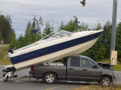 Trailer Inspection [Picture of boat trailer accident].