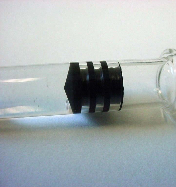 Pre-filled syringe, showing plunger and associated rings.