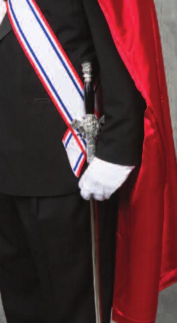 POSITION OF ATTENTION WHEN WEARING THE SWORD A. WITH SWORD IN THE SCABBARD 1.