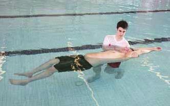 CHAPTER 11 CARING FOR HEAD, NECK AND SPINAL INJURIES 249 Do not delay removal from the water by strapping the victim onto the board or using the head immobilizer device. 6.