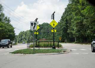 Black Creek Greenway Road Crossing - Cary, NC Crossings of major roads with high traffic may require a pedestrian refuge island, pedestrian