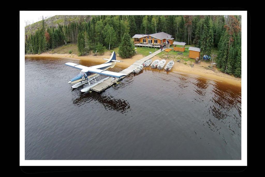 Turn right on Nestor Falls Fly-In Road. Drive ½ mile until the road opens onto a paved parking lot. Would you prefer to travel by air?