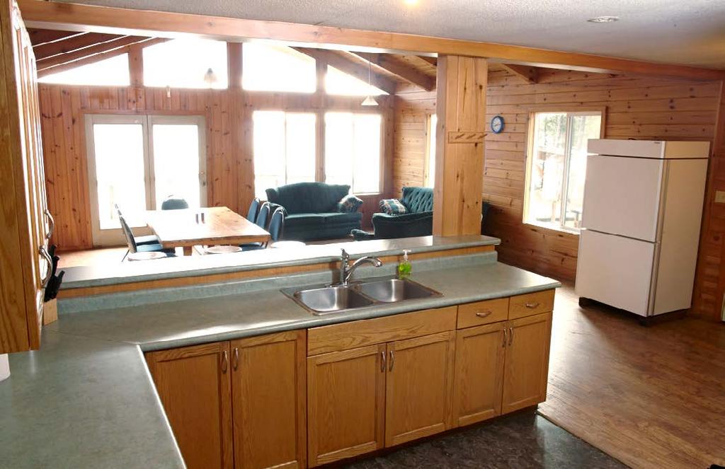 The cabin is large enough to accommodate a full-size family comfortably and at the end of the day you can take in the untouched beauty of Canada s wilderness from the deck overlooking the lake or