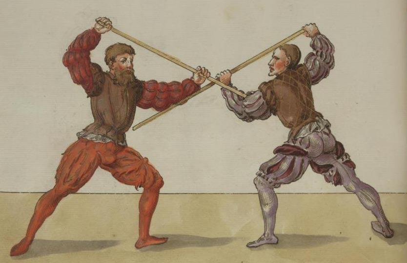 A Gewicht Stab against a Groin Stab 14/384 When you come to close with the opponent, step in with your left leg and hold your staff with your right hand above your head and your left hand well