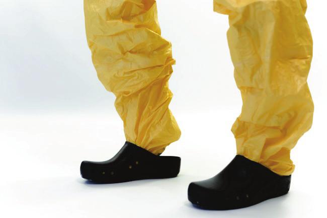 Safe use of PPE in the treatment of infectious diseases of high consequence TECHNICAL DOCUMENT [+/ ]Option D: Clogs combined with coveralls with integrated foot sections Coverall foots sections step