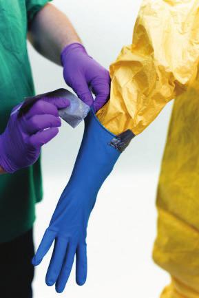 TECHNICAL DOCUMENT Safe use of PPE in the treatment of infectious diseases of high consequence [+/+] Alternative option A2: basic taping (without spacer) Pull the glove up over the sleeve of the PPE