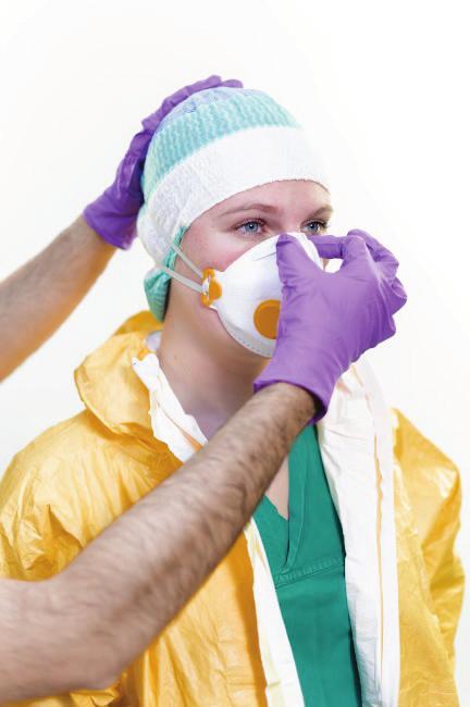 This procedure is not part of the regular donning process. Instead, an orientation fit test is done every time a respirator is put on, to ensure that the respirator is fitted properly.
