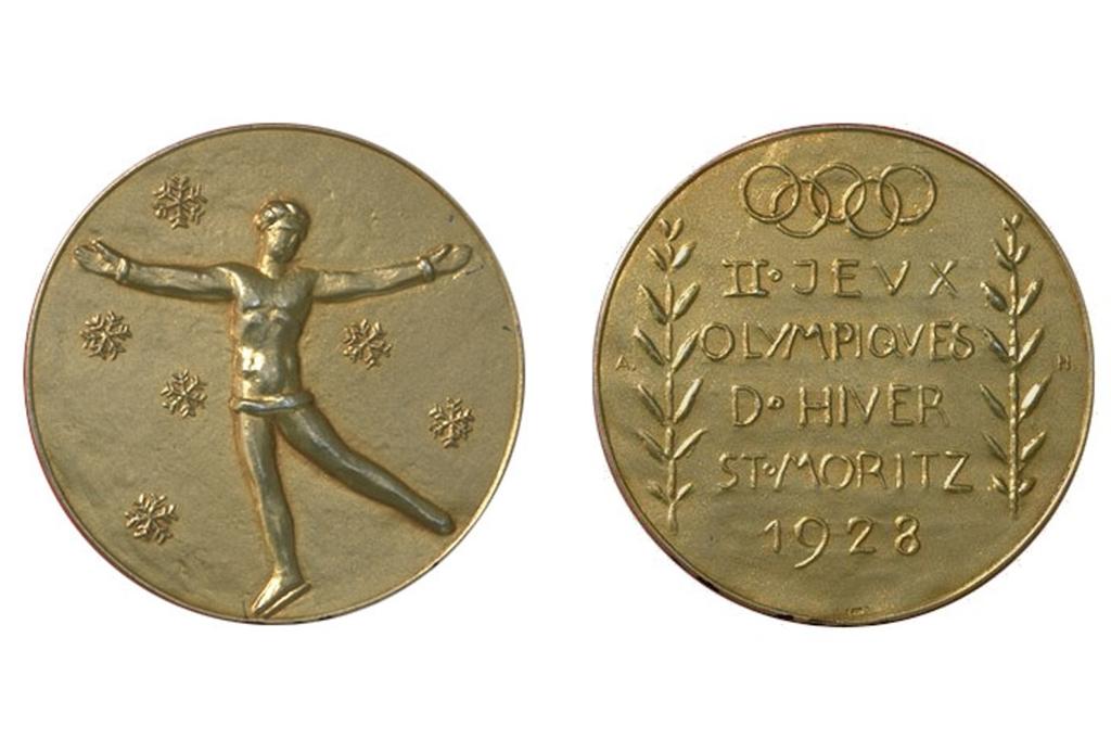 ST. MORITZ 1928 On the obverse, a skater with her arms spread out, surrounded by snow crystals. The reverse comprised of the Olympic rings at the top with the inscription II. JEUX OLYMPIQUES D.