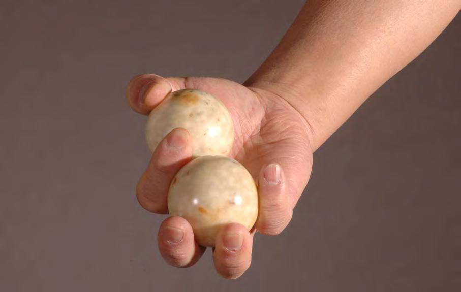 1 0 0 C h a p t e r 5 : Ta i j i B a l l Q i g o n g T r a i n i n g Figure 5-3. Taiji balls used for the hands Figure 5-4. Taiji ball movement in hands Sizes. The sizes of balls are varied.