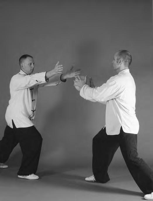 This exercise will help develop your fa jin skills as well as assist you in intercepting, yielding, and neutralizing jins. To begin, face each other in si liu bu stance, approximately six feet apart.