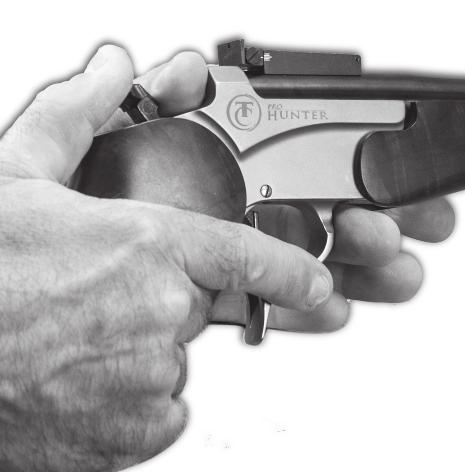 off the trigger and out of the trigger guard (FIGURE 21). FIGURE 21 Place the thumb of your firing hand on the hammer spur.